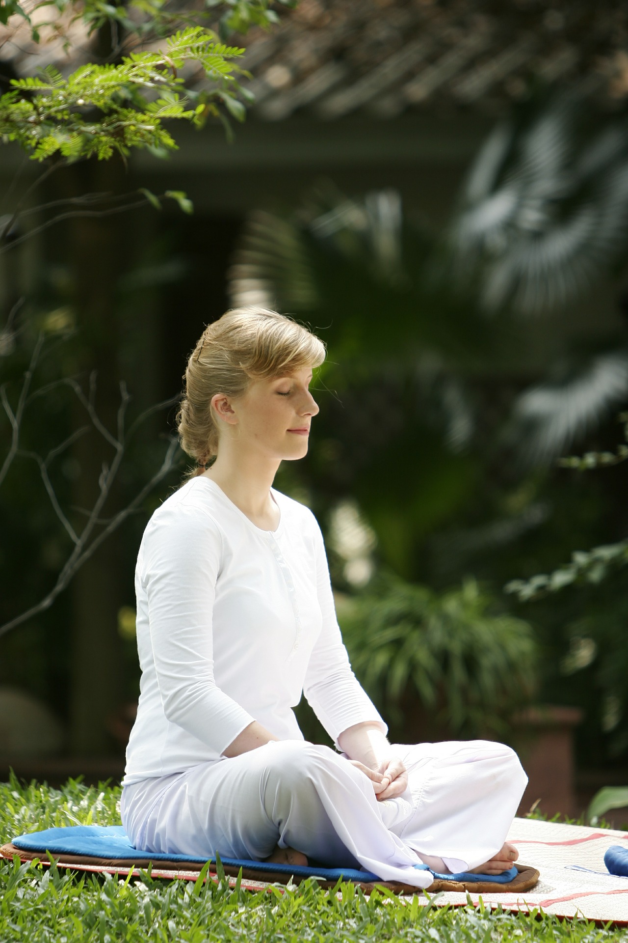 woman sits in meditation